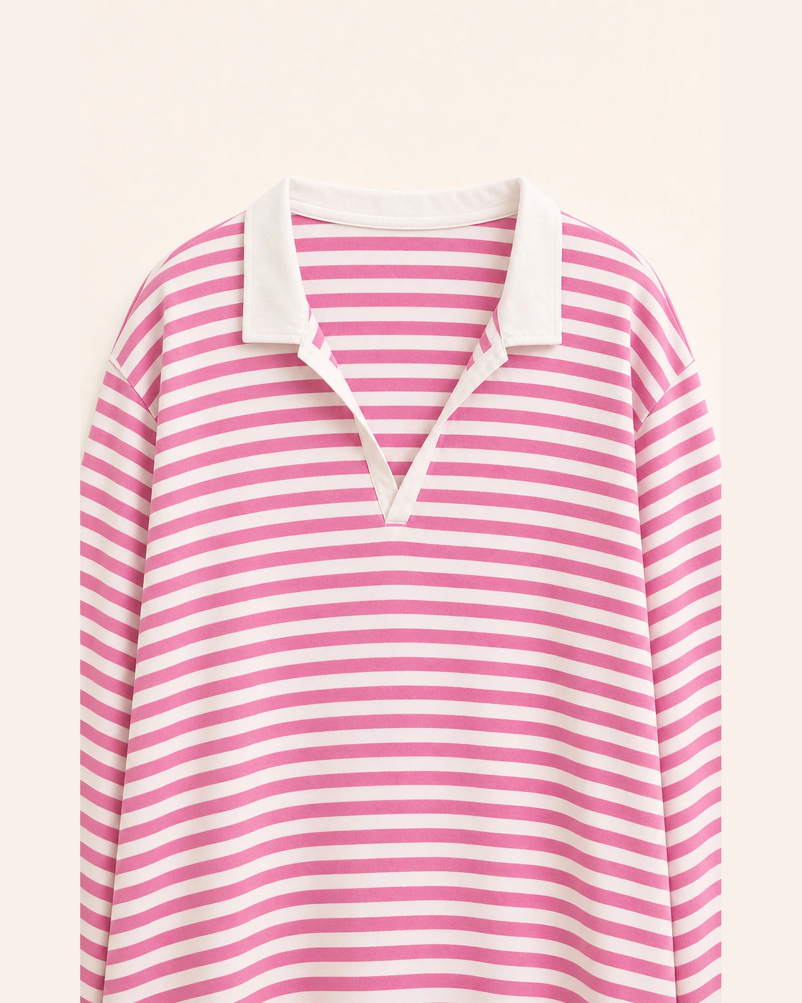 Close-up of contrast spread collar and open V neck on VTLS-0002 top