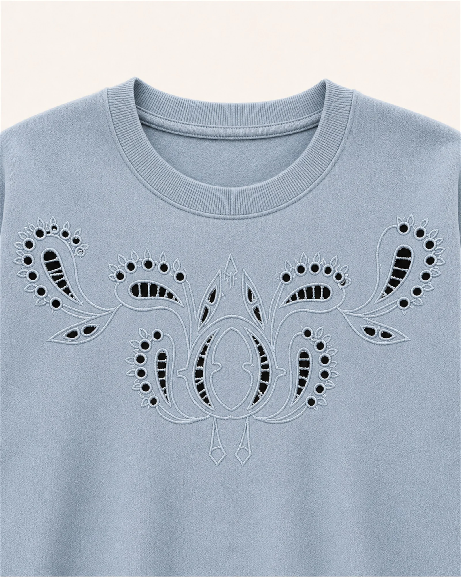 Close-up of tonal cutwork embroidery on VTHD-0001 sweatshirt
