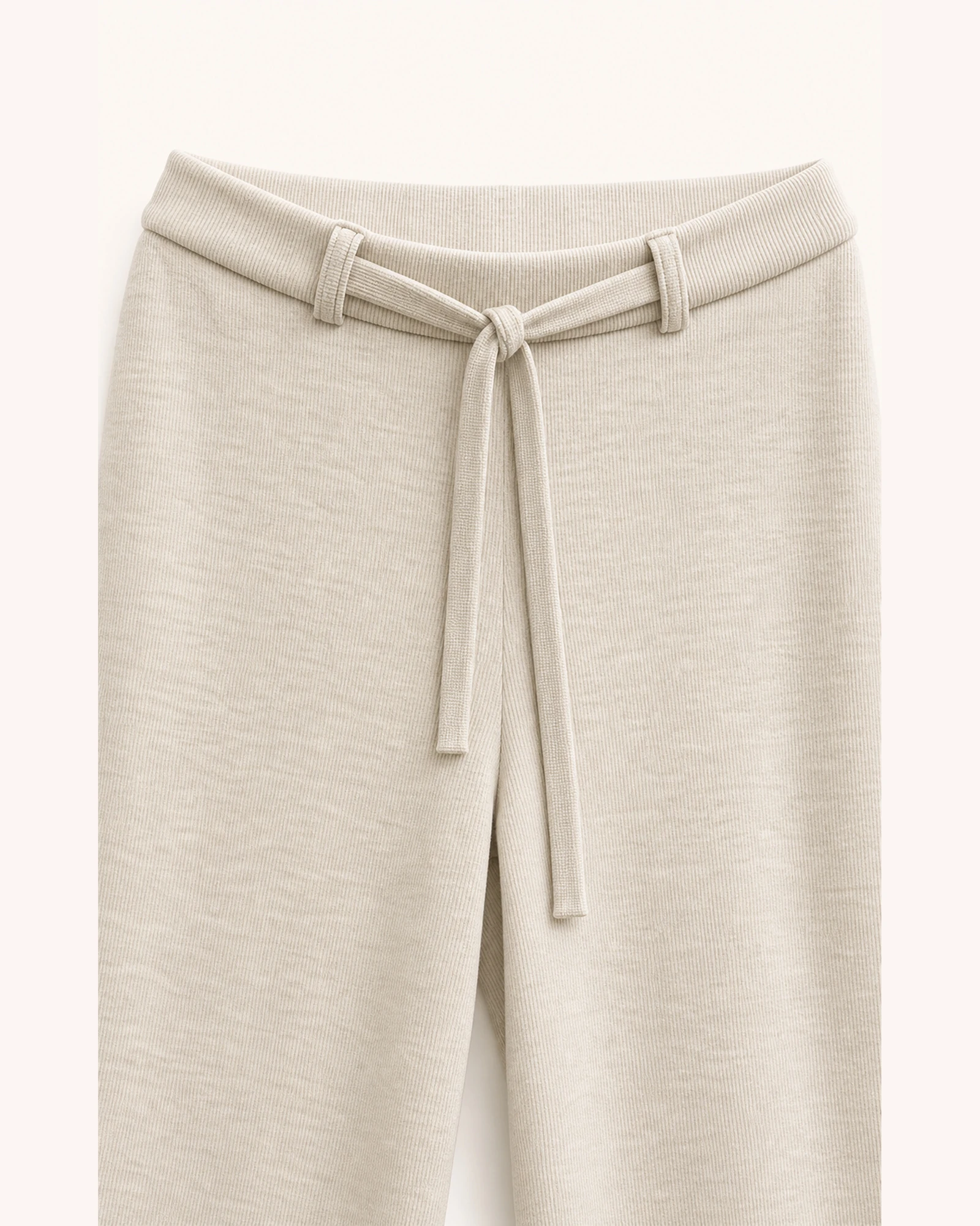 Close-up of matching fabric belt and belt loops on VTP-0001 pants