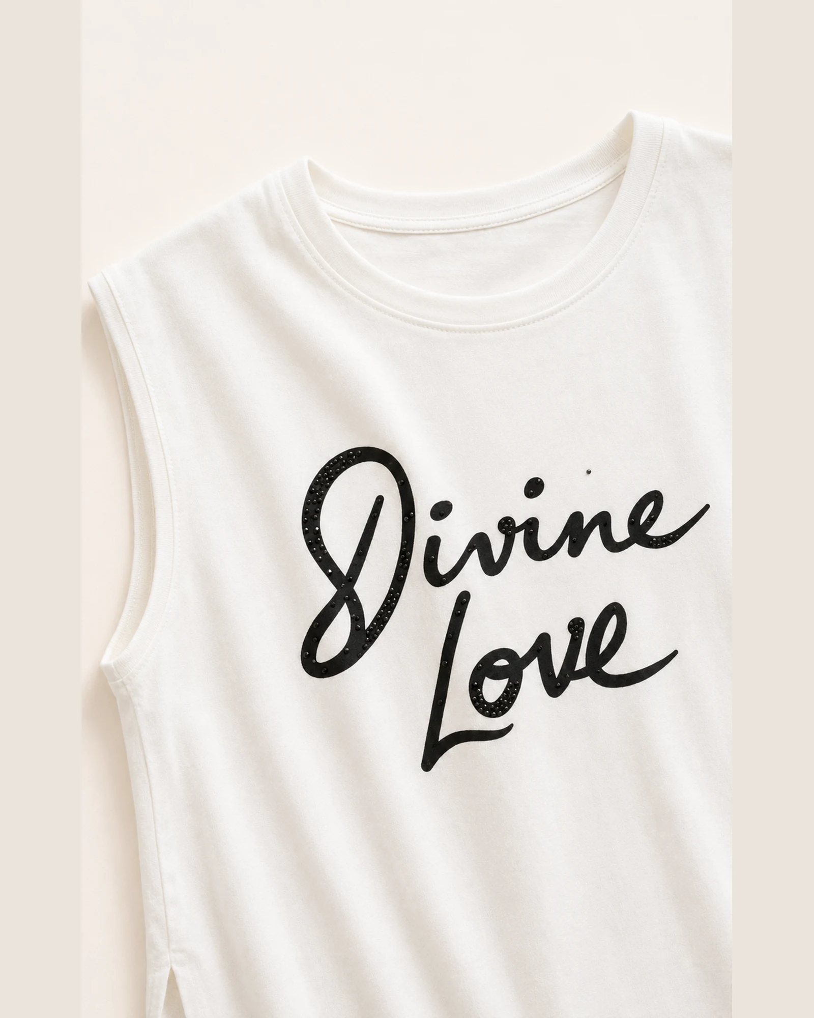 Custom Women’s Studded Graphic Side-Slit Tank Top — VTTT-0007 Close-up of the black studded Divine Love script on VTTT-0007