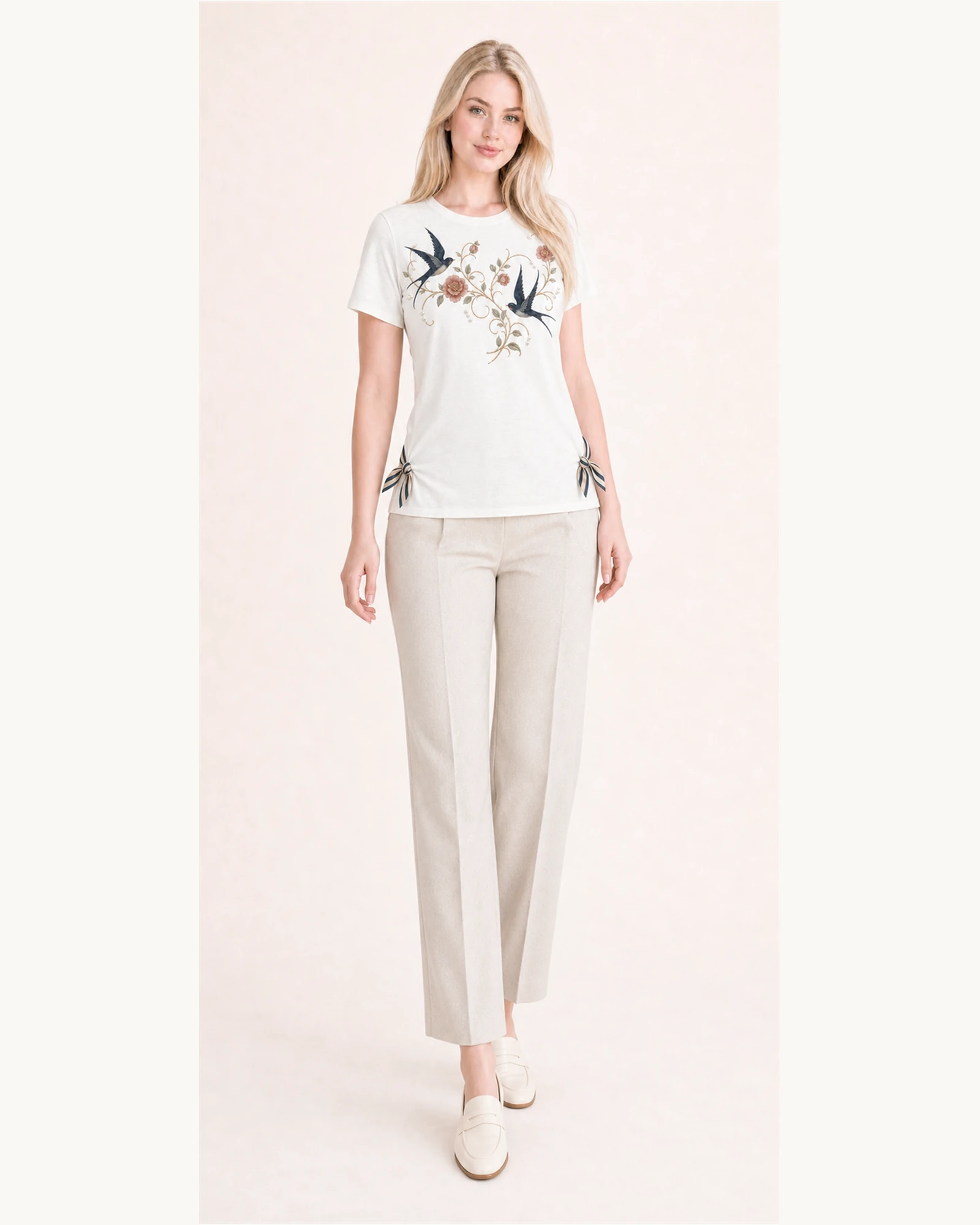 Custom Women’s Swallow Floral Side-Tie T-Shirt — VTTS-0012 Full-body model wearing VTTS-0012 ivory swallow floral side-tie t-shirt