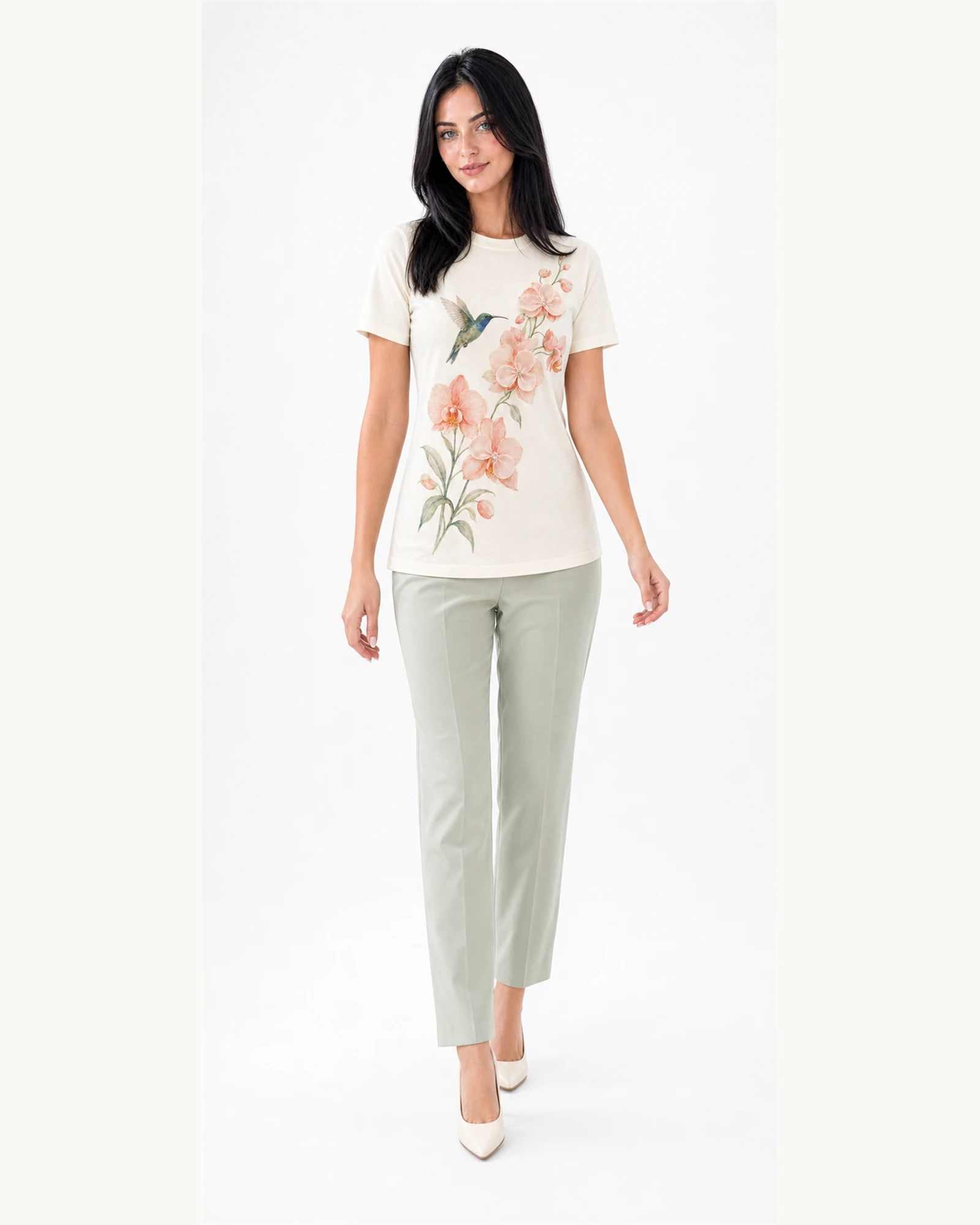 Custom Women’s Hummingbird Floral Print T-Shirt — VTTS-0014 Full-body model wearing VTTS-0014 ivory hummingbird floral t-shirt