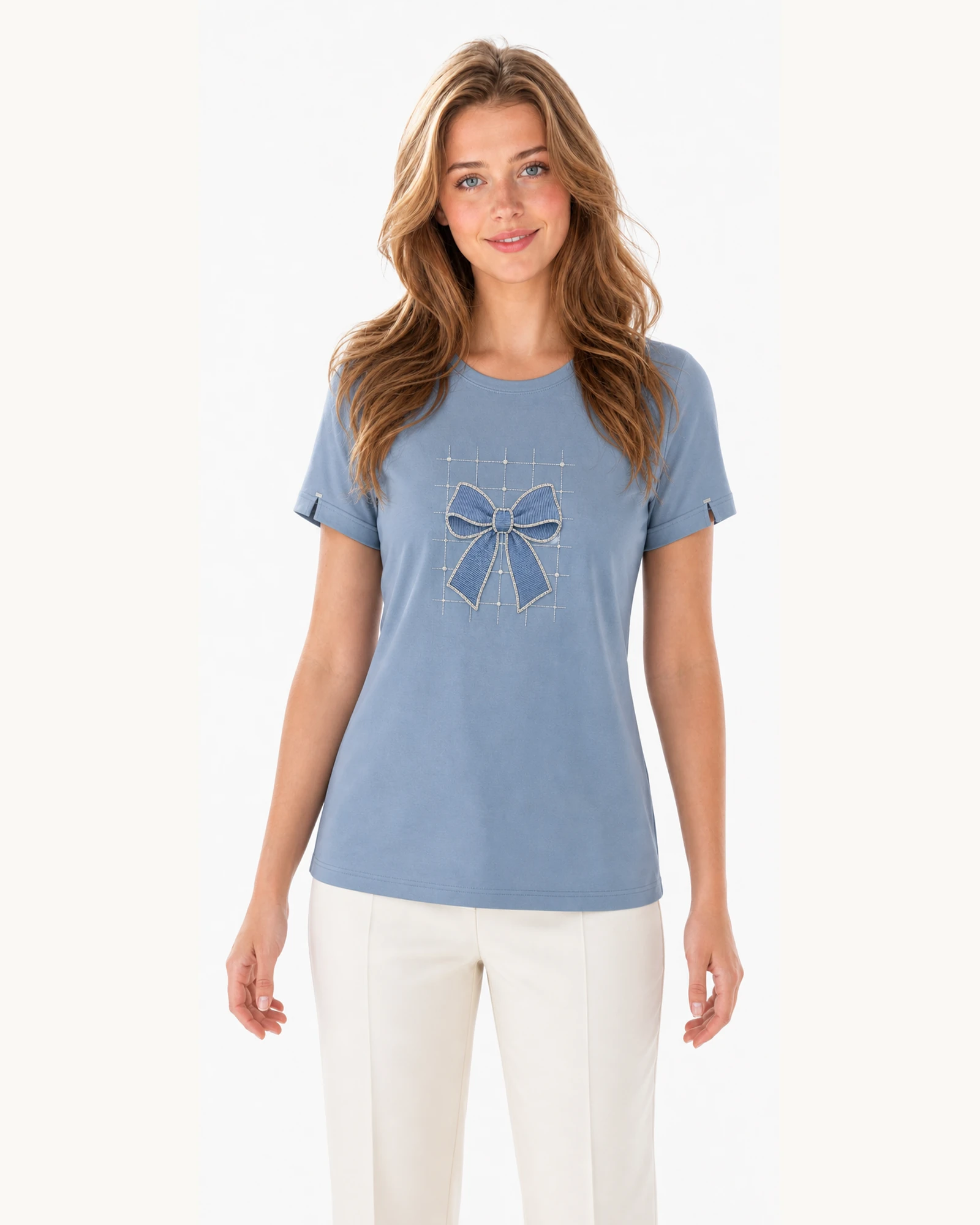 Model wearing VTTS-0015 mist blue rhinestone bow t-shirt, close view