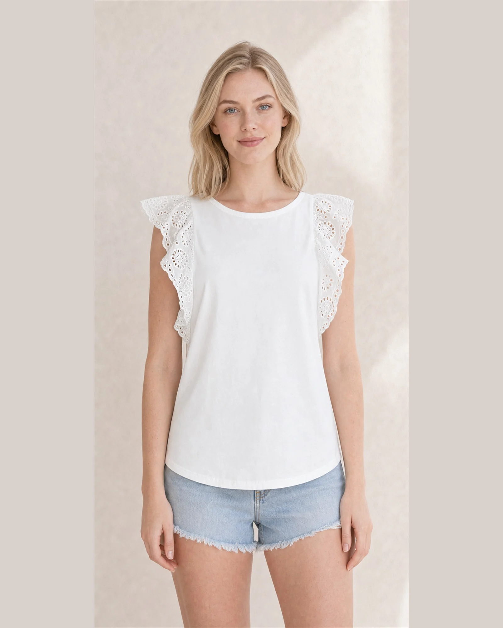 Custom Women’s Eyelet Ruffle-Shoulder Tank Top — VTTT-0006 Model wearing VTTT-0006 white eyelet ruffle-shoulder tank top