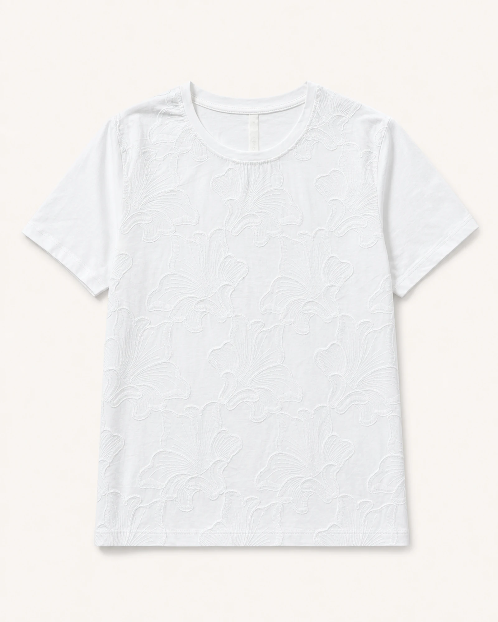 Custom Women’s Apparel Products Women’s white tonal floral embroidered crew-neck T-shirt, flat lay