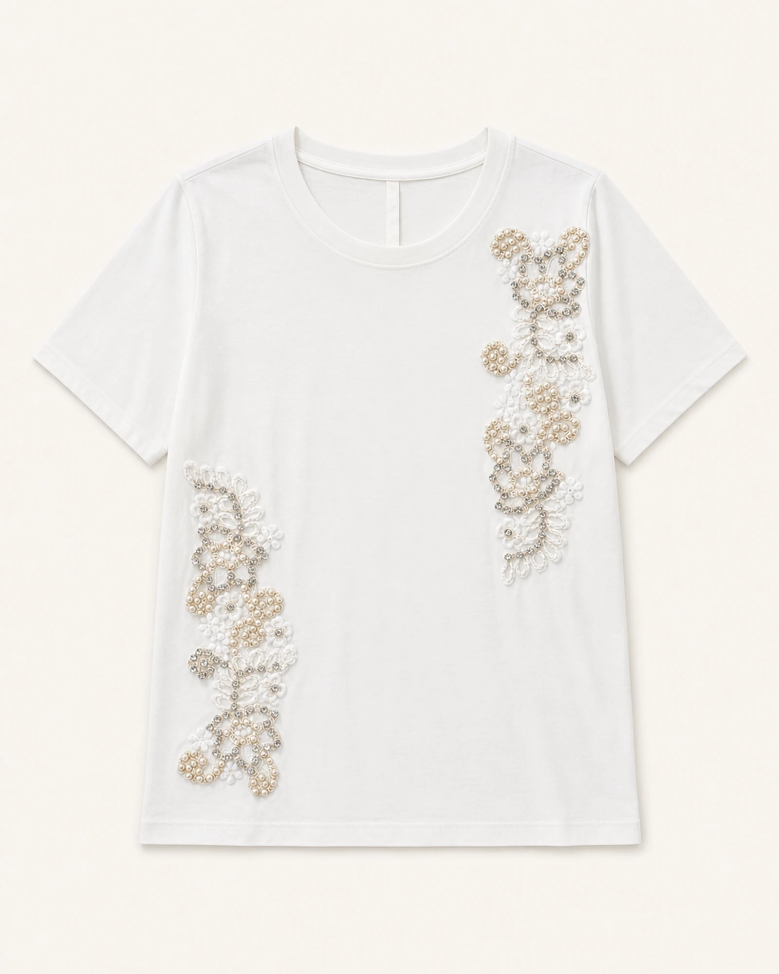 Custom Women’s Apparel Products Women’s white pearl and rhinestone floral appliqué T-shirt, flat lay