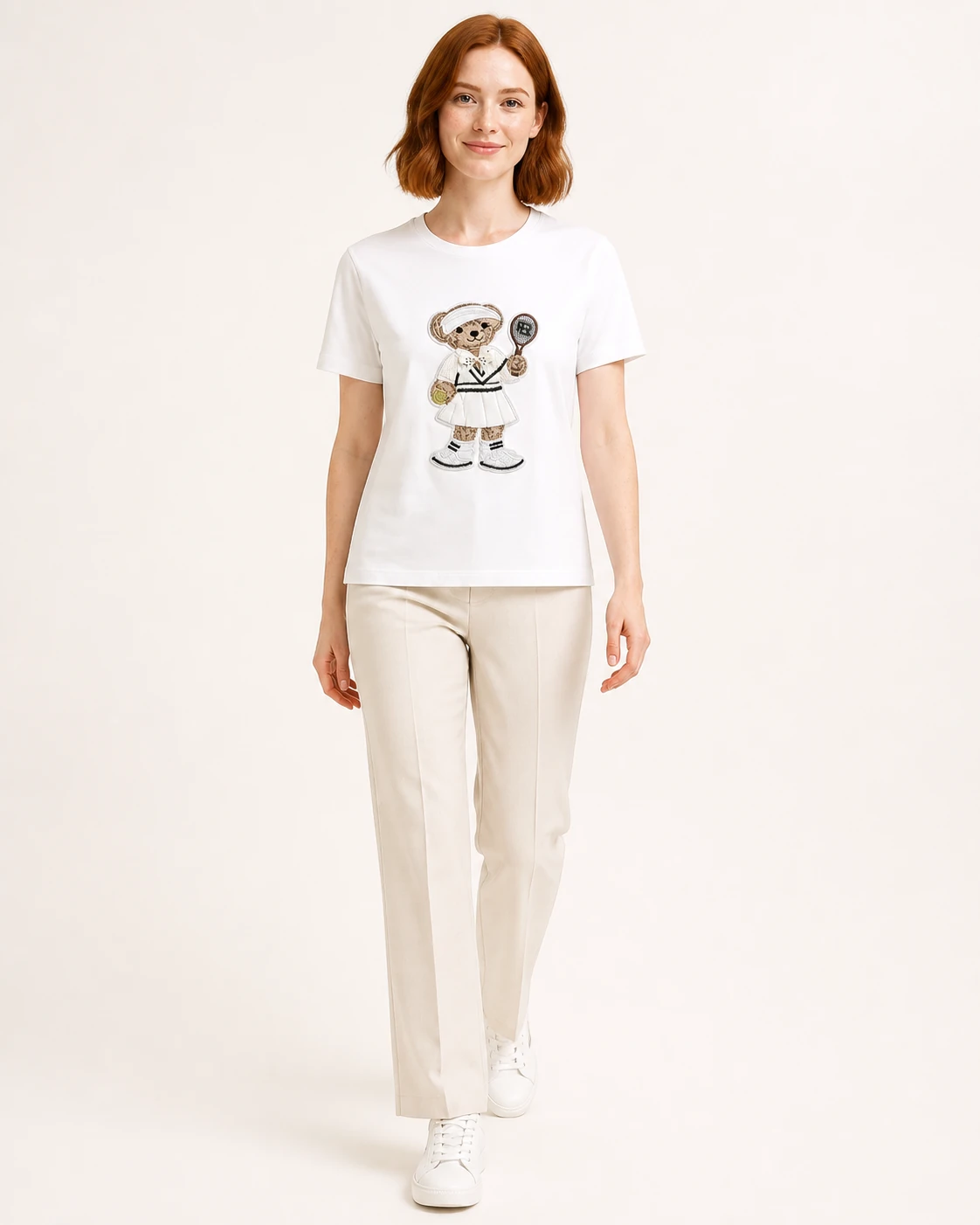 Custom Women's Tennis Bear Embroidered Crew Neck T-Shirt — VTTS-0024 Model wearing the white VTTS-0024 tennis bear embroidered T-shirt