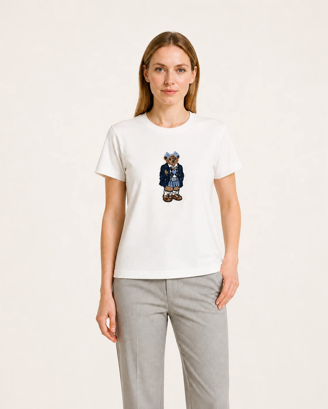 Model wearing the white VTTS-0025 preppy bear embroidered T-shirt