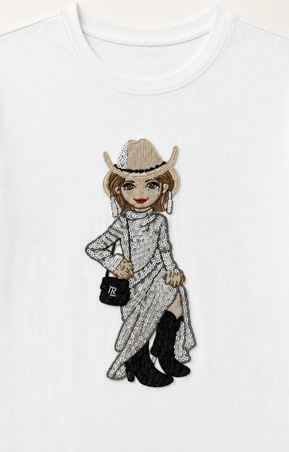Close-up of the sequin cowgirl embroidery and applique on VTTS-0027