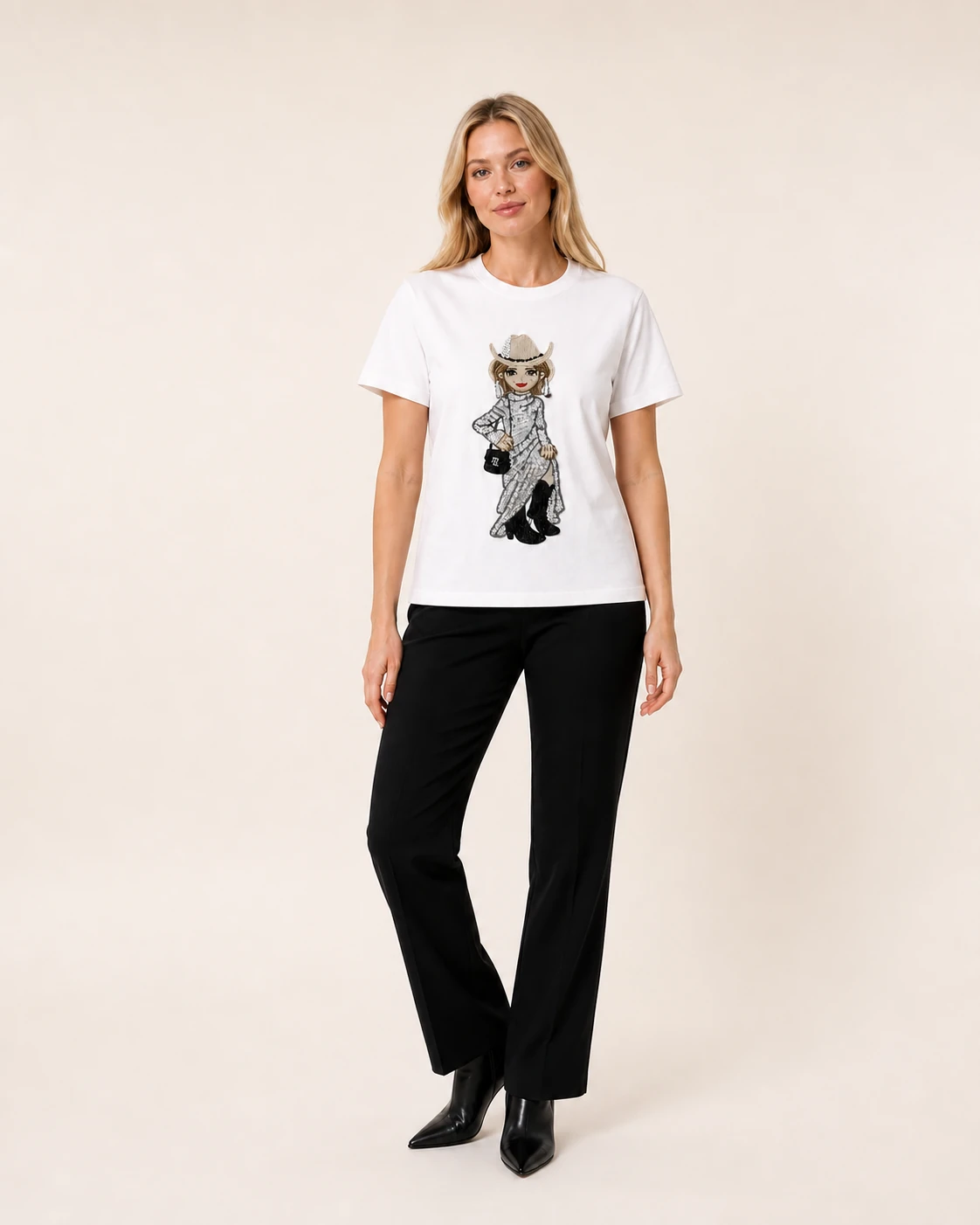 Model wearing the white VTTS-0027 sequin cowgirl embroidered T-shirt