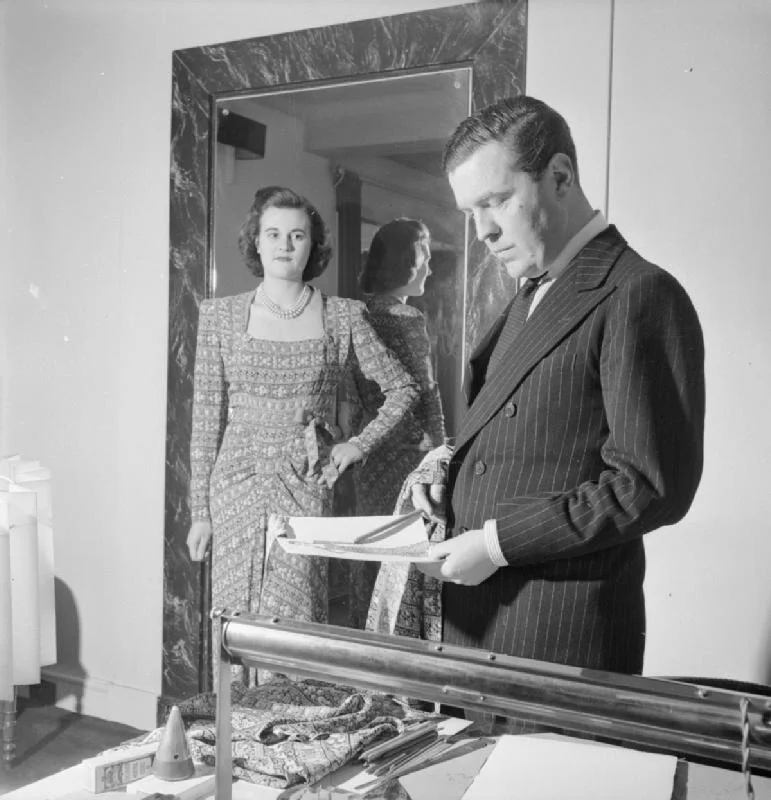 Women’s T-Shirt Sampling and Development Fashion designer reviewing a garment design brief and sketches