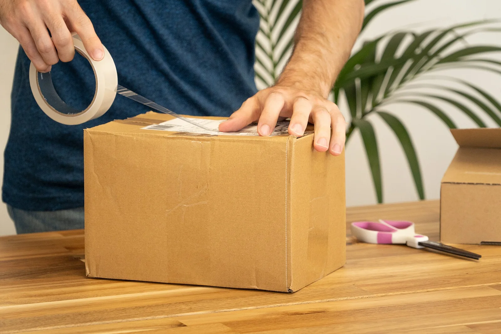 Women’s T-Shirt Sampling and Development Shipping label applied to a parcel for sample delivery
