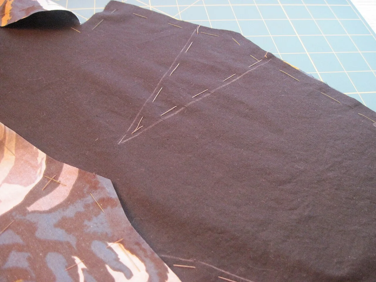 Women’s T-Shirt Sampling and Development Pattern pieces basted to fabric before garment cutting