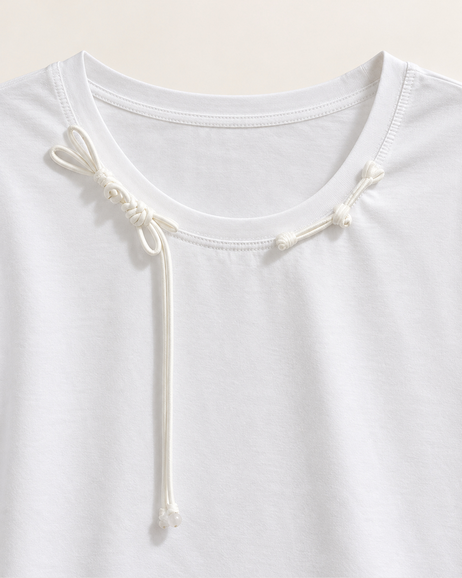 Custom Women’s Cord-Detail Neckline Crew Neck T-Shirt — VTTS-0042 Close-up of the decorative cord detail draped around the crew neckline on VTTS-0042