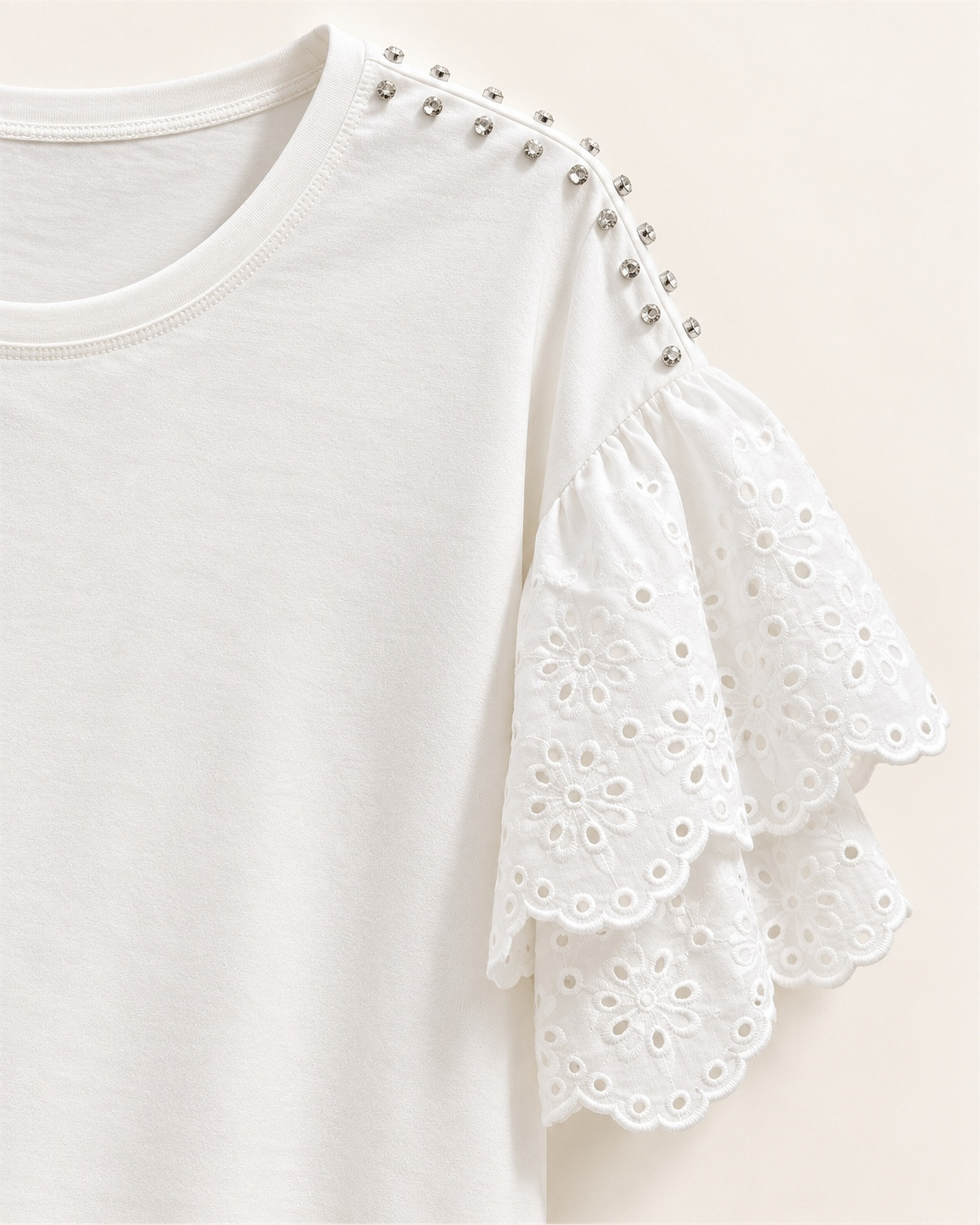 Custom Women’s Layered Lace-Sleeve T-Shirt with Shoulder Studs — VTTS-0054 Close-up of the layered eyelet lace sleeves with stud accents at the shoulders on VTTS-0054